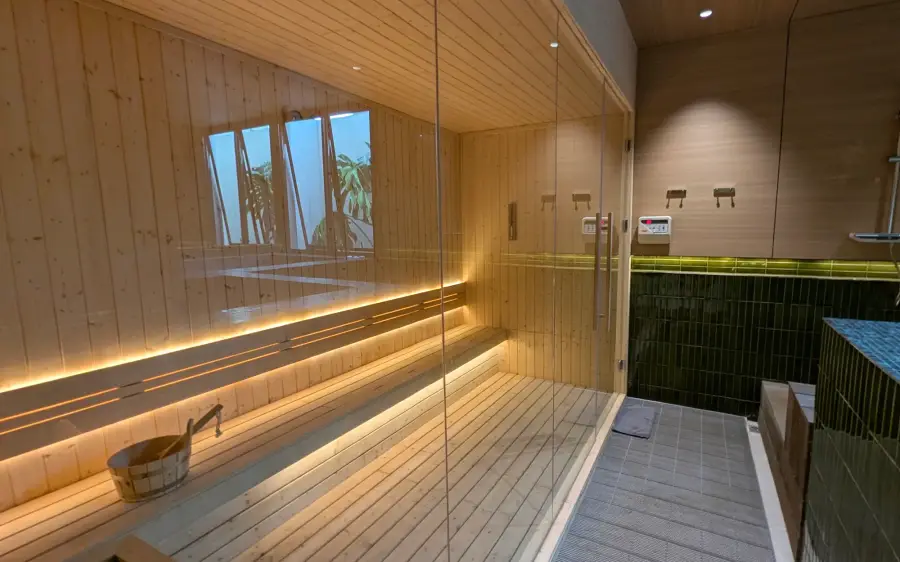 Timber sauna with lit benches