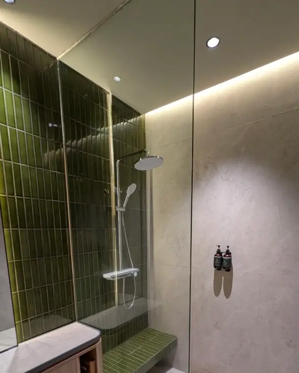Green-tiled shower