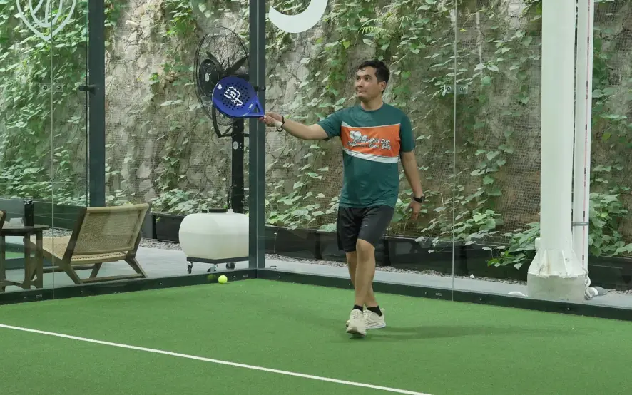 A player hitting a forehand