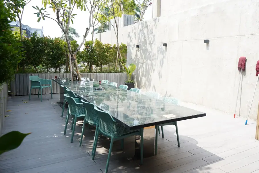 Long glass table on the outdoor terrace